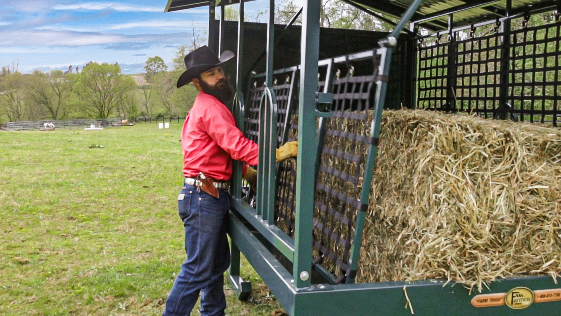 exterior photo of man and hay feeder for why horses pee on their hay post