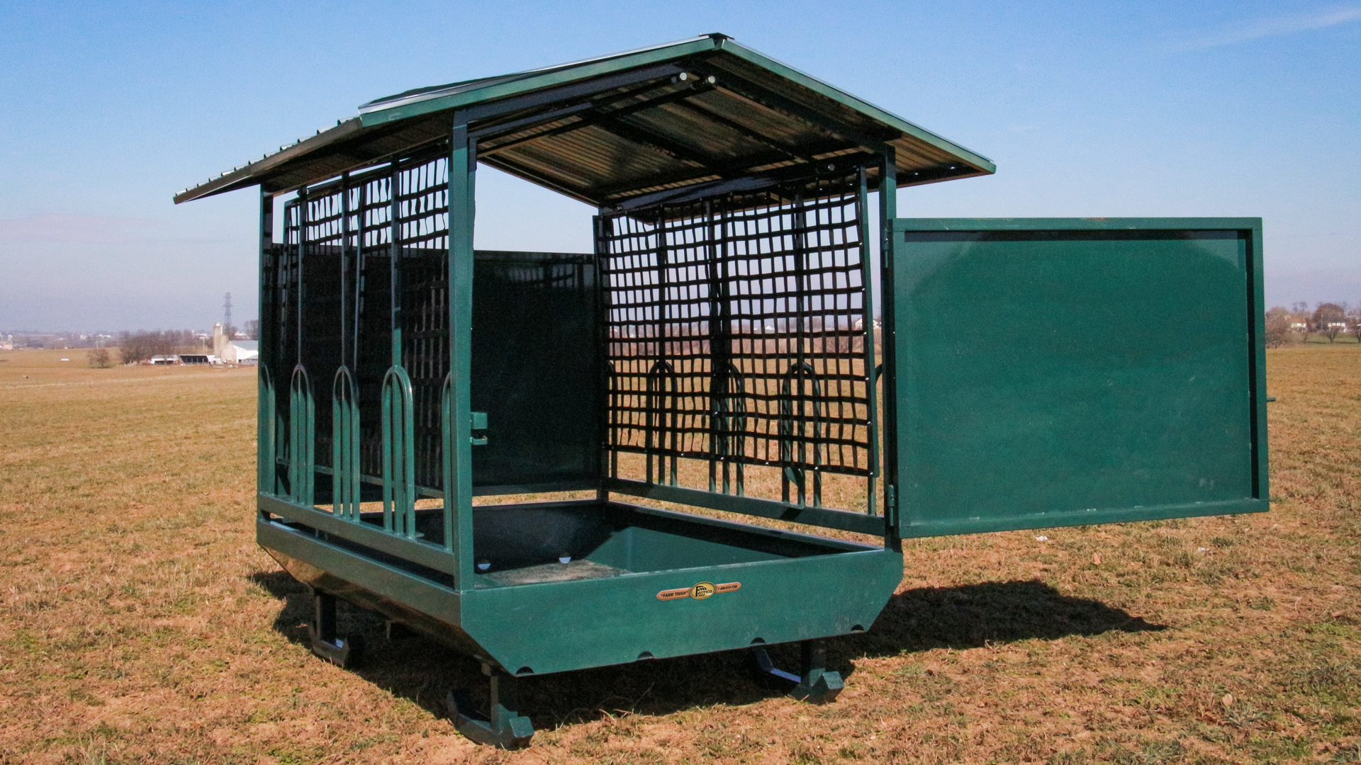 a slow feeder for round bales for horses